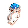 3 Carat Cushion Cut Blue Topaz and Halo Diamond Ring With Fancy Band In 14 Karat Rose Gold Image-2