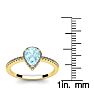 Aquamarine Ring: Aquamarine Jewelry: 3/4 Carat Pear Shape Aquamarine and Halo Diamond Ring In 14 Karat Yellow Gold Image-5