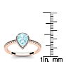 Aquamarine Ring: Aquamarine Jewelry: 3/4 Carat Pear Shape Aquamarine and Halo Diamond Ring In 14 Karat Rose Gold Image-5
