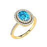1 3/4 Carat Oval Shape Blue Topaz and Double Halo Diamond Ring In 14 Karat Yellow Gold Image-2