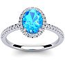 1 3/4 Carat Oval Shape Blue Topaz and Halo Diamond Ring In 14 Karat White Gold Image-1