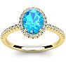 1 3/4 Carat Oval Shape Blue Topaz and Halo Diamond Ring In 14 Karat Yellow Gold Image-1