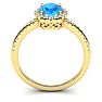 1 3/4 Carat Oval Shape Blue Topaz and Halo Diamond Ring In 14 Karat Yellow Gold Image-3