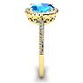 1 3/4 Carat Oval Shape Blue Topaz and Halo Diamond Ring In 14 Karat Yellow Gold Image-4