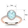 Aquamarine Ring: Aquamarine Jewelry: 1 1/3 Carat Oval Shape Aquamarine and Halo Diamond Ring In 14 Karat Rose Gold Image-5