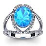 3 3/4 Carat Oval Shape Blue Topaz and Halo Diamond Ring In 14 Karat White Gold Image-1
