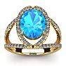 3 3/4 Carat Oval Shape Blue Topaz and Halo Diamond Ring In 14 Karat Yellow Gold Image-1