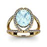 Aquamarine Ring: Aquamarine Jewelry: 2 3/4 Carat Oval Shape Aquamarine and Halo Diamond Ring In 14 Karat Yellow Gold Image-1