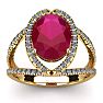 3 1/2 Carat Oval Shape Ruby and Halo Diamond Ring In 14 Karat Yellow Gold Image-1