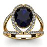 3 1/2 Carat Oval Shape Sapphire and Halo Diamond Ring In 14 Karat Yellow Gold Image-1