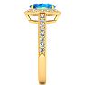 1 3/4 Carat Oval Shape Blue Topaz and Halo Diamond Ring In 14 Karat Yellow Gold Image-4