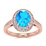 1 3/4 Carat Oval Shape Blue Topaz and Halo Diamond Ring In 14 Karat Rose Gold Image-1