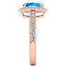 1 3/4 Carat Oval Shape Blue Topaz and Halo Diamond Ring In 14 Karat Rose Gold Image-4