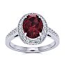 Garnet Ring: Garnet Jewelry: 1 3/4 Carat Oval Shape Garnet and Halo Diamond Ring In 14 Karat White Gold Image-1