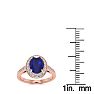 1 3/4 Carat Oval Shape Sapphire and Halo Diamond Ring In 14 Karat Rose Gold Image-6