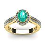 1 1/4 Carat Oval Shape Emerald and Halo Diamond Ring In 14 Karat Yellow Gold Image-1