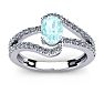 Aquamarine Ring: Aquamarine Jewelry: 1 1/4 Carat Oval Shape Aquamarine and Fancy Diamond Ring In 14 Karat White Gold Image-1