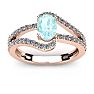 Aquamarine Ring: Aquamarine Jewelry: 1 1/4 Carat Oval Shape Aquamarine and Fancy Diamond Ring In 14 Karat Rose Gold Image-1