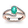 1 1/4 Carat Oval Shape Emerald and Fancy Diamond Ring In 14 Karat Rose Gold Image-1