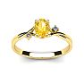 1/2 Carat Oval Shape Citrine and Two Diamond Accent Ring In 14 Karat Yellow Gold Image-1