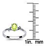 1/2 Carat Oval Shape Peridot and Two Diamond Accent Ring In 14 Karat White Gold Image-5