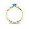 1/2 Carat Oval Shape Blue Topaz and Two Diamond Accent Ring In 14 Karat Yellow Gold Image-4