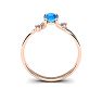 1/2 Carat Oval Shape Blue Topaz and Two Diamond Accent Ring In 14 Karat Rose Gold Image-4