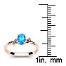 1/2 Carat Oval Shape Blue Topaz and Two Diamond Accent Ring In 14 Karat Rose Gold Image-5