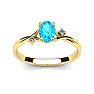 Aquamarine Ring: Aquamarine Jewelry: 1/2 Carat Oval Shape Aquamarine and Two Diamond Accent Ring In 14 Karat Yellow Gold Image-1
