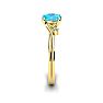 Aquamarine Ring: Aquamarine Jewelry: 1/2 Carat Oval Shape Aquamarine and Two Diamond Accent Ring In 14 Karat Yellow Gold Image-3