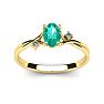 1/2 Carat Oval Shape Emerald and Two Diamond Accent Ring In 14 Karat Yellow Gold Image-1