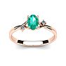 1/2 Carat Oval Shape Emerald and Two Diamond Accent Ring In 14 Karat Rose Gold Image-1