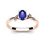 1/2 Carat Oval Shape Tanzanite and Two Diamond Accent Ring In 14 Karat Rose Gold Image-1