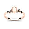 1/2 Carat Oval Shape Morganite and Two Diamond Accent Ring In 14 Karat Rose Gold Image-1