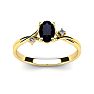 1/2 Carat Oval Shape Sapphire and Two Diamond Accent Ring In 14 Karat Yellow Gold Image-1