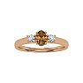 1/2 Carat Oval Shape Citrine and Two Diamond Ring In 14 Karat Rose Gold Image-1