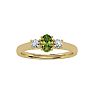 3/4 Carat Oval Shape Peridot and Two Diamond Ring In 14 Karat Yellow Gold Image-1