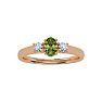 3/4 Carat Oval Shape Peridot and Two Diamond Ring In 14 Karat Rose Gold Image-1