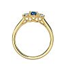 3/4 Carat Oval Shape Blue Topaz and Two Diamond Ring In 14 Karat Yellow Gold Image-3