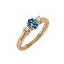 3/4 Carat Oval Shape Blue Topaz and Two Diamond Ring In 14 Karat Rose Gold Image-2