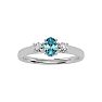 Aquamarine Ring: Aquamarine Jewelry: 1/2 Carat Oval Shape Aquamarine and Two Diamond Ring In 14 Karat White Gold Image-1