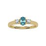 Aquamarine Ring: Aquamarine Jewelry: 1/2 Carat Oval Shape Aquamarine and Two Diamond Ring In 14 Karat Yellow Gold Image-1