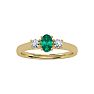 1/2 Carat Oval Shape Emerald and Two Diamond Ring In 14 Karat Yellow Gold Image-1