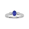 3/4 Carat Oval Shape Tanzanite and Two Diamond Ring In 14 Karat White Gold Image-1
