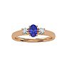 3/4 Carat Oval Shape Tanzanite and Two Diamond Ring In 14 Karat Rose Gold Image-1