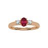3/4 Carat Oval Shape Ruby and Two Diamond Ring In 14 Karat Rose Gold Image-1