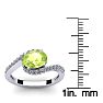1 1/2 Carat Oval Shape Peridot and Halo Diamond Ring In 14 Karat White Gold Image-5