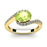 1 1/2 Carat Oval Shape Peridot and Halo Diamond Ring In 14 Karat Yellow Gold Image-1