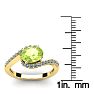 1 1/2 Carat Oval Shape Peridot and Halo Diamond Ring In 14 Karat Yellow Gold Image-5