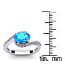 1 3/4 Carat Oval Shape Blue Topaz and Halo Diamond Ring In 14 Karat White Gold Image-5